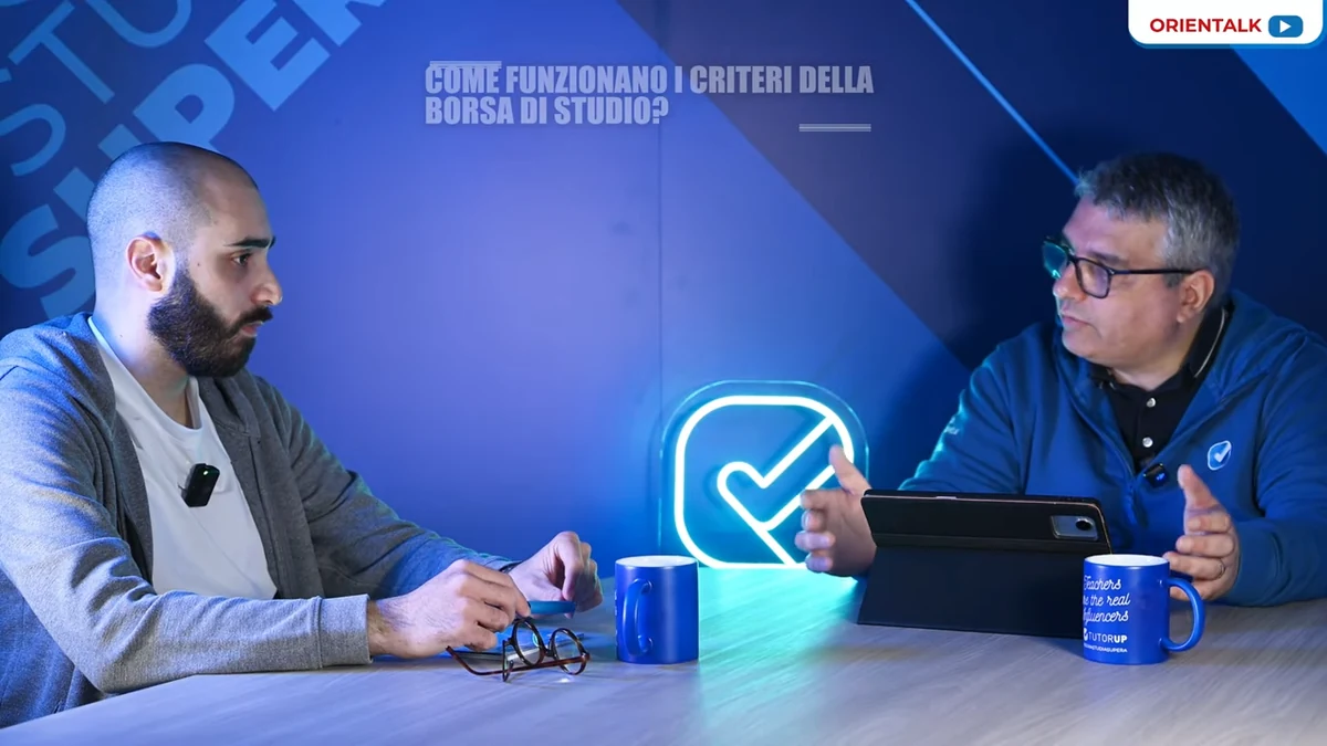 Alberto Cervera, rappresentante degli studenti nel CdA ADISURC, con il Direttore di Tutor Up nello Speciale Orientalk sui criteri della borsa di studio